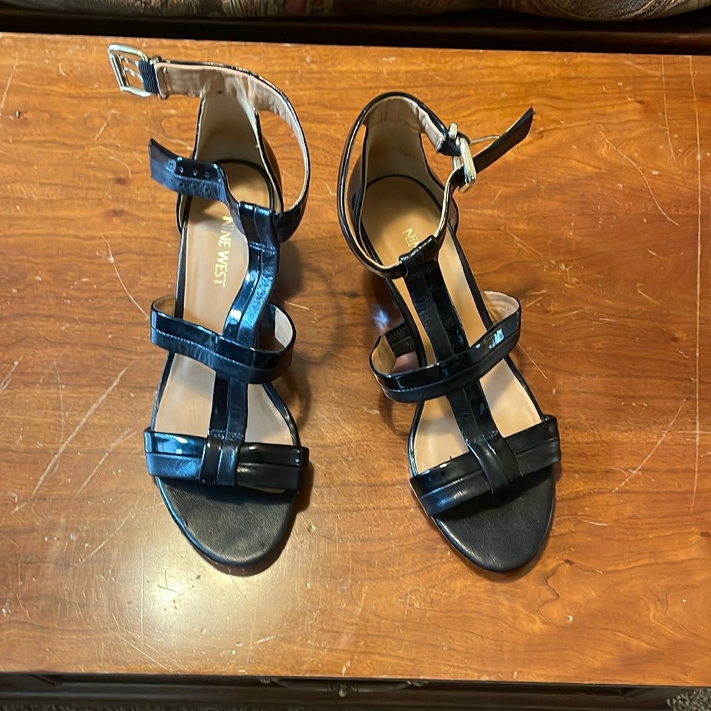 Nine West patents gladiator wedge sandals.